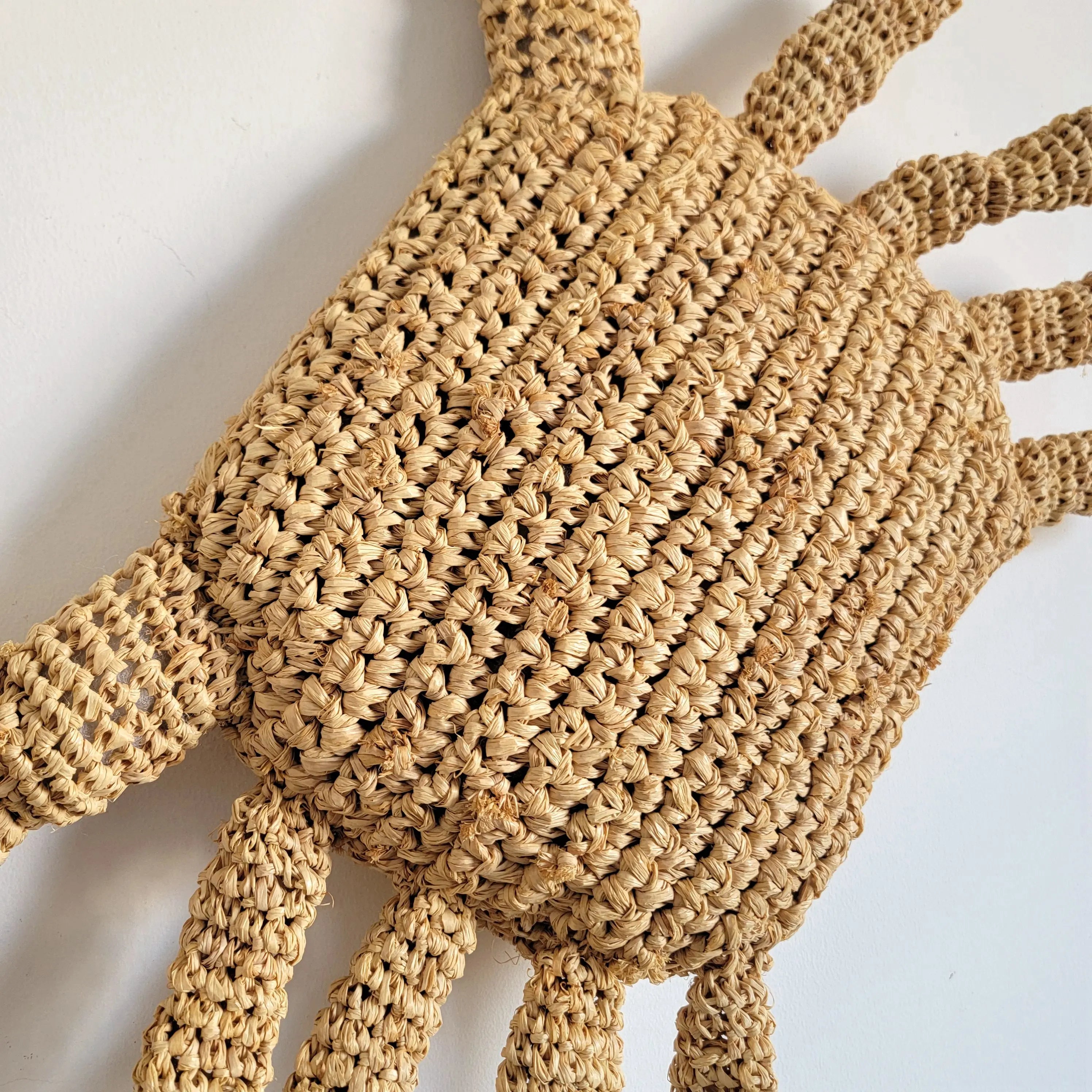 Coussin crabe en raphia naturel bohème