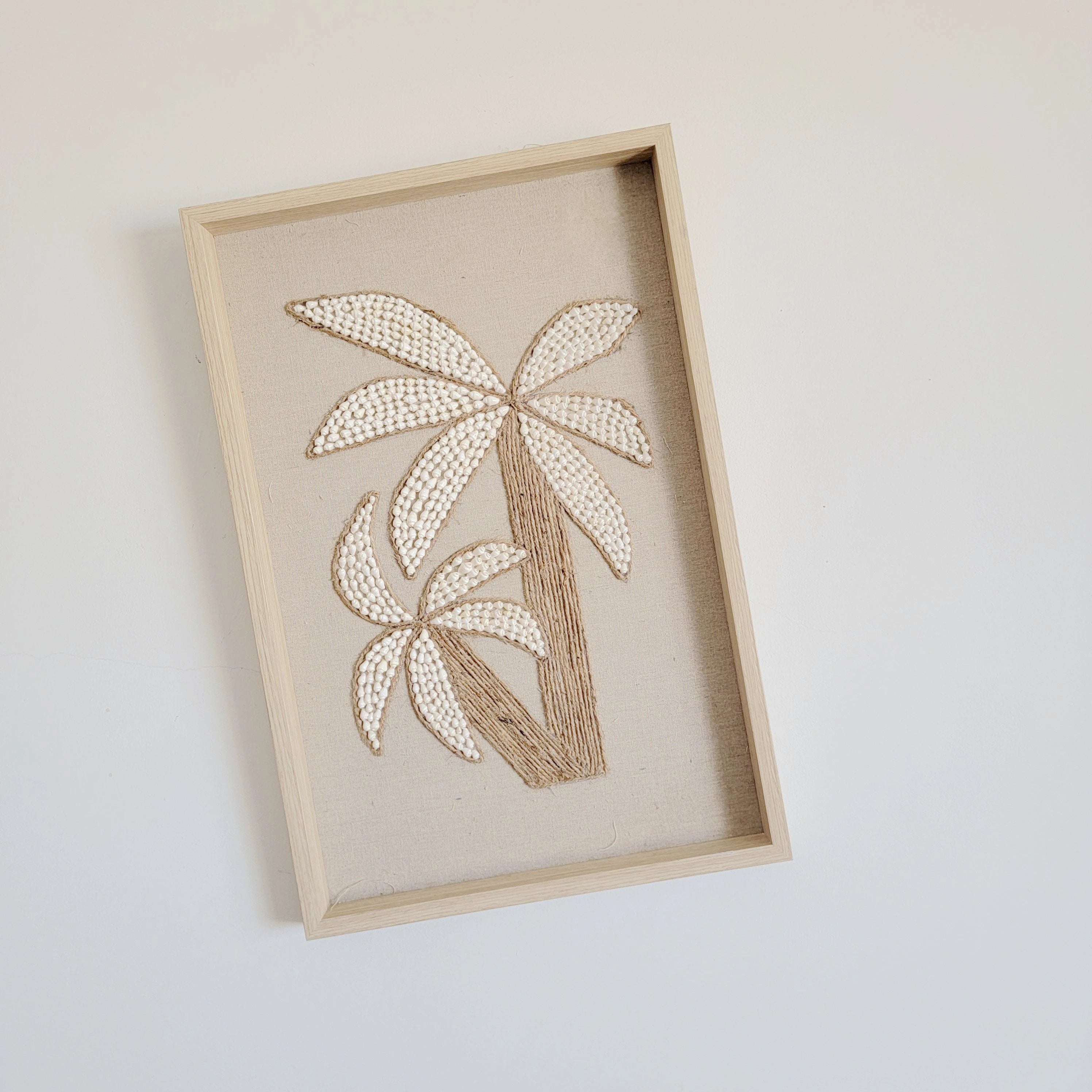 Cadre décoratif murale palmier coquillages bohème