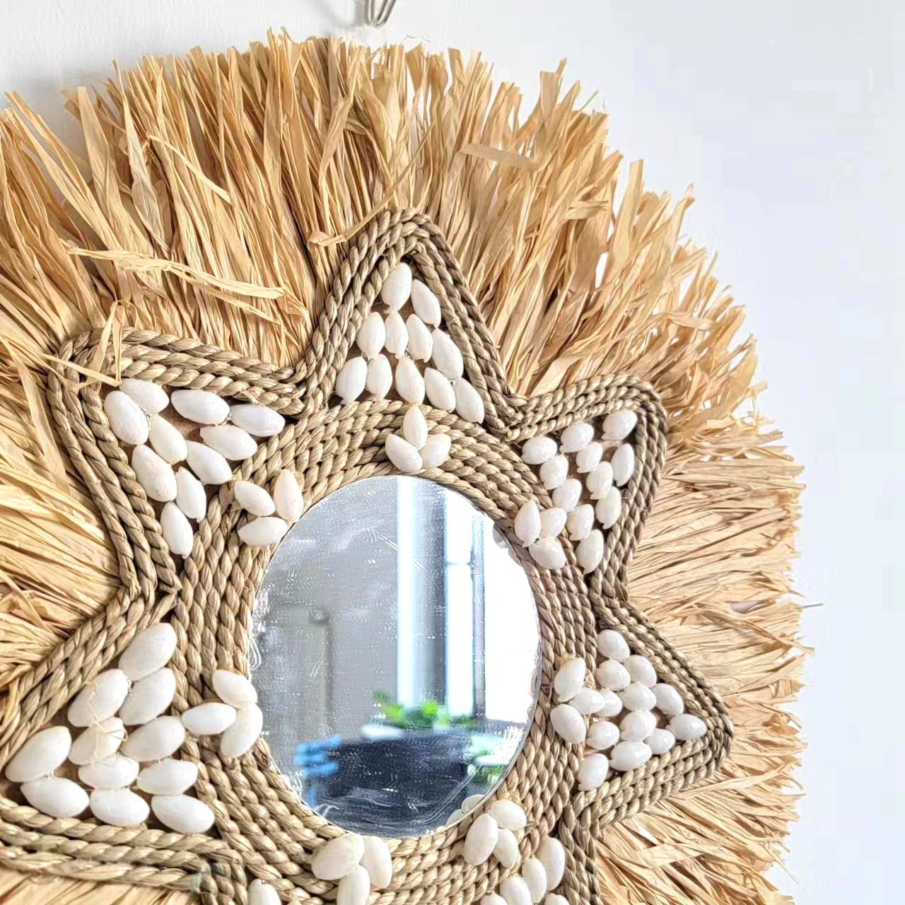 Miroir mural étoile en raphia et coquillages