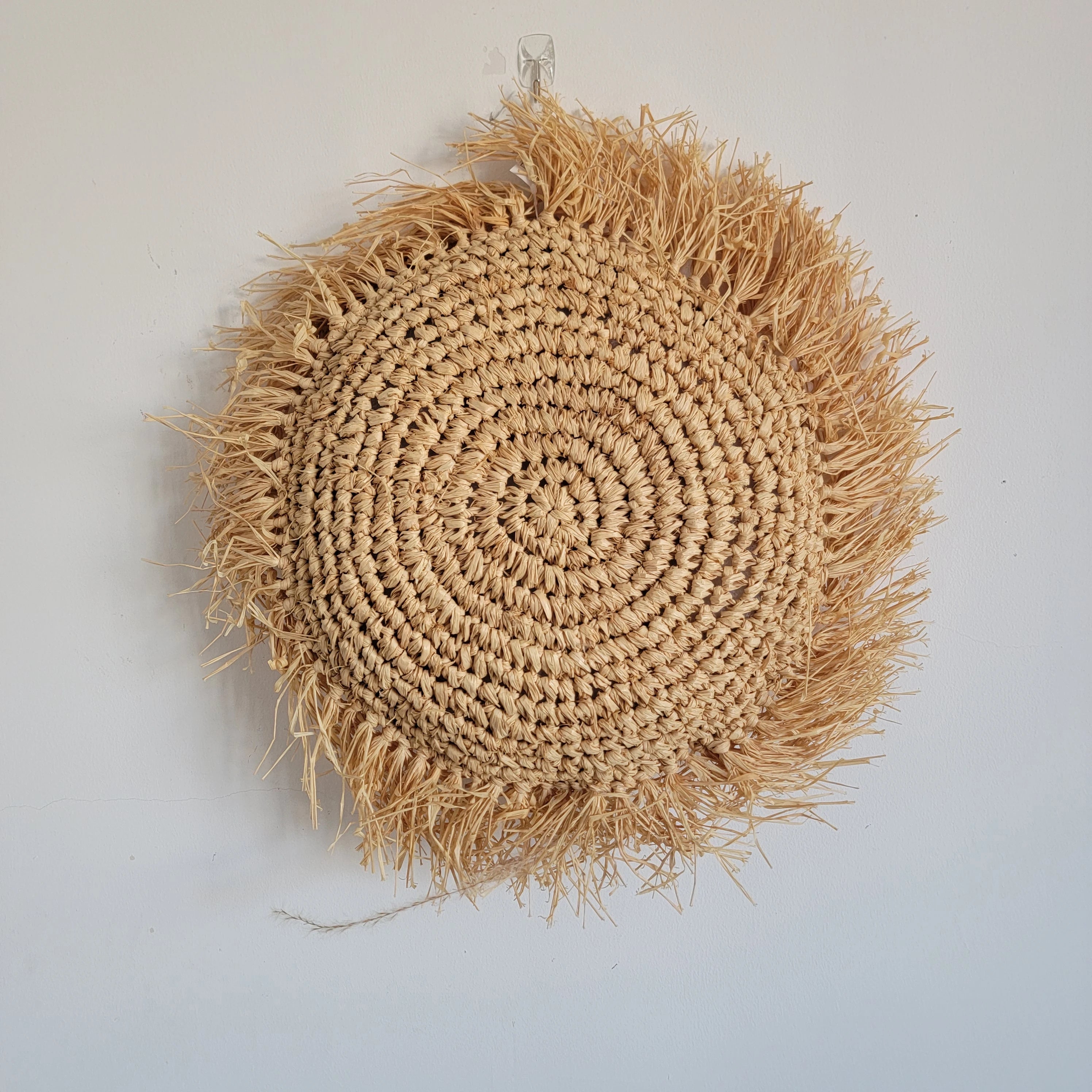 Coussin décoratif bohème rond en raphia