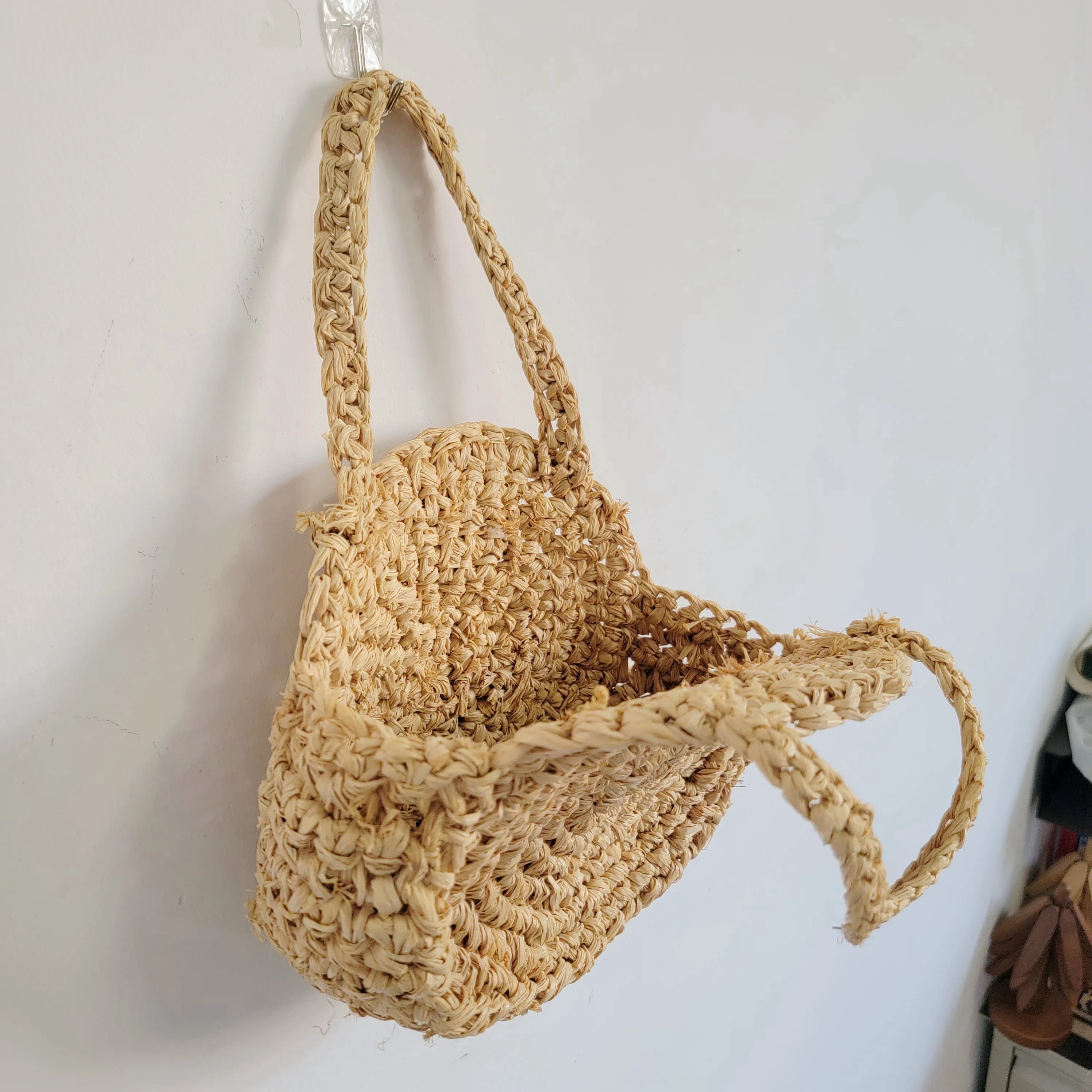 Sac rond en raphia tressé à la main