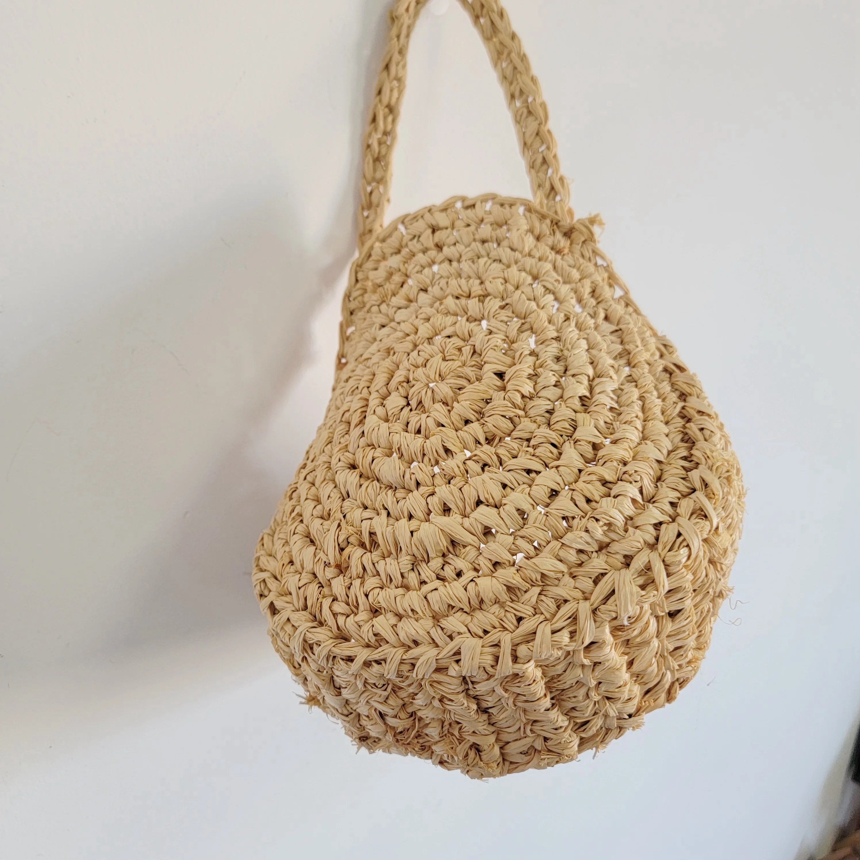 Sac rond en raphia tressé à la main